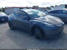 2023 Tesla Model Y Awd/long Range Dual Motor All-wheel Drive Gray vin: 7SAYGDEE8PA044835