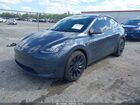 2023 Tesla Model Y Awd/long Range Dual Motor All-wheel Drive Gray vin: 7SAYGDEE8PA044835