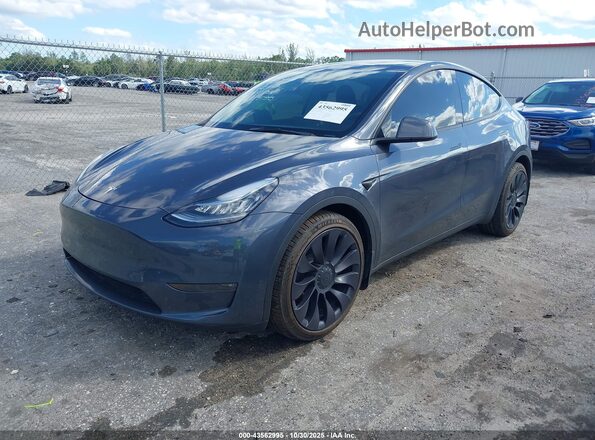 7SAYGDEE8PA044835 2023 TESLA MODEL Y Gray Przód lewy