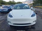 2025 Tesla Model Y Long Range Dual Motor All-wheel Drive White vin: 7SAYGDEE8SF295138