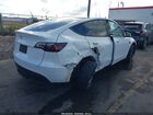 2025 Tesla Model Y Long Range Dual Motor All-wheel Drive White vin: 7SAYGDEE8SF295138