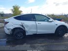 2025 Tesla Model Y Long Range Dual Motor All-wheel Drive White vin: 7SAYGDEE8SF295138