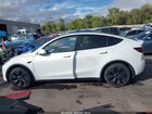 2025 Tesla Model Y Long Range Dual Motor All-wheel Drive White vin: 7SAYGDEE8SF295138