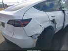 2025 Tesla Model Y Long Range Dual Motor All-wheel Drive White vin: 7SAYGDEE8SF295138