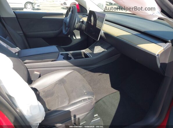 7SAYGDEE9PA039403 2023 TESLA MODEL Y Red Vista interior delantera
