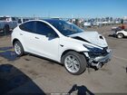 2023 Tesla Model Y Awd/long Range Dual Motor All-wheel Drive White vin: 7SAYGDEE9PF632858