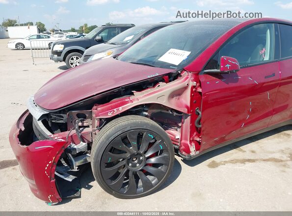 7SAYGDEF1SA351359 2025 TESLA MODEL Y Maroon Widok z przodu