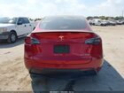 2025 Tesla Model Y Performance Dual Motor All-wheel Drive Maroon vin: 7SAYGDEF1SA351359