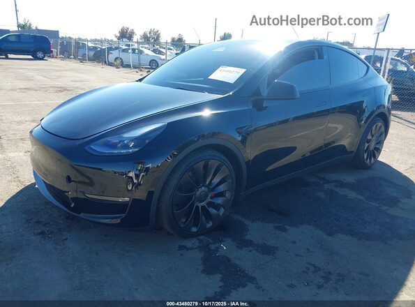 7SAYGDEF7PF908219 2023 TESLA MODEL Y Black წინა მარცხენა ხედი სამი მეოთხედიდან