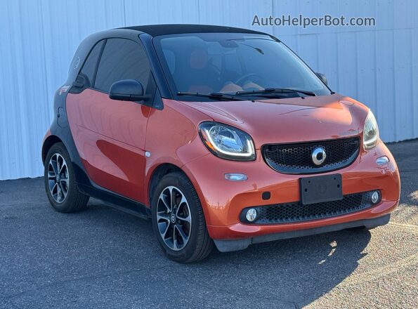 WMEFJ9BAXHK230583 2017 SMART FORTWO Оранжевый Передняя левая четверть