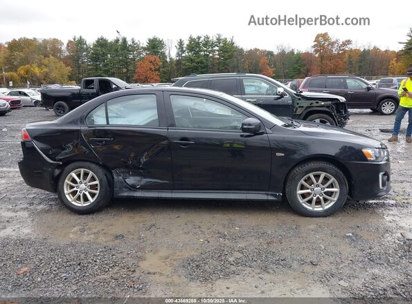 JA32V2FW5GU009666 2016 MITSUBISHI LANCER Черный Вид задней части салона