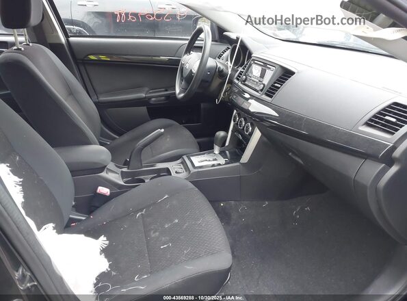 JA32V2FW5GU009666 2016 MITSUBISHI LANCER Черный Вид салона спереди