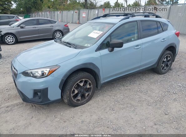 JF2GTAAC7KG217660 2019 SUBARU CROSSTREK Light Blue Передняя левая четверть