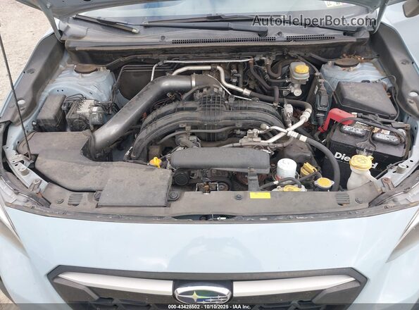 JF2GTAAC7KG217660 2019 SUBARU CROSSTREK Light Blue Вид сзади