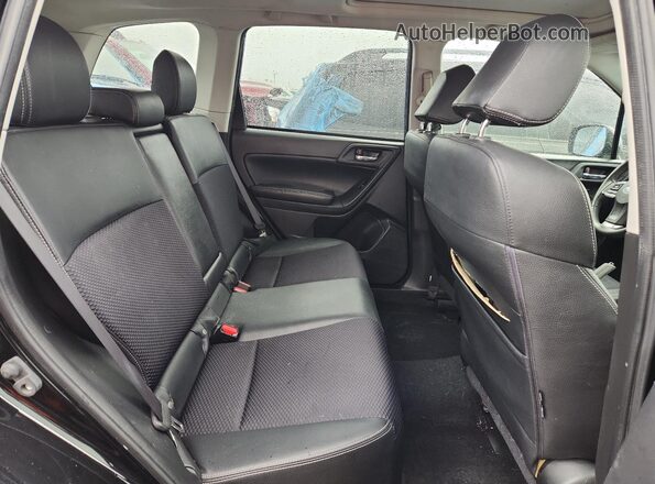 JF2SJGDC7GH461213 2016 SUBARU FORESTER2. Черный Вид задней части салона