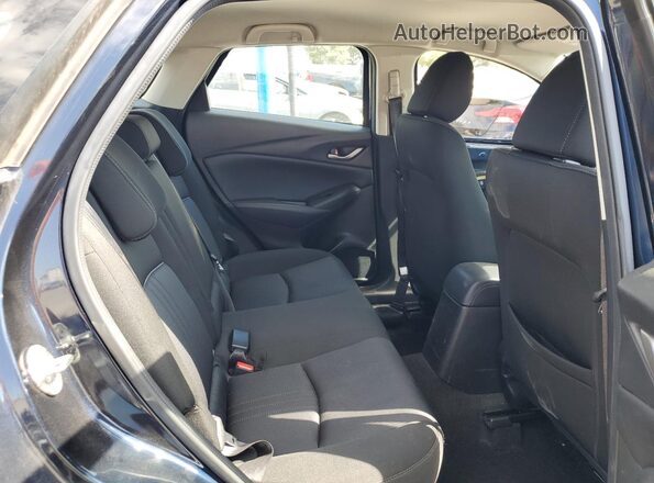 JM1DKDB78L1470451 2020 MAZDA CX-3 Blue Vista de los asientos traseros