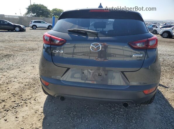 JM1DKDC74H0175018 2017 MAZDA CX-3 Серый Вид сзади
