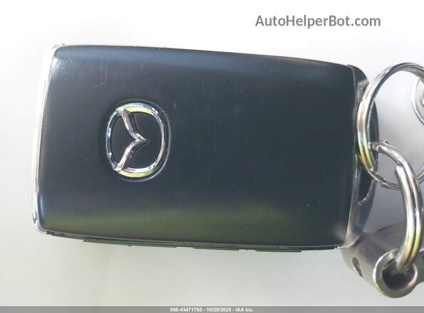 JM3KKEHA2R1151112 2024 MAZDA CX-90 PHEV Бежевый Вид панели приборов