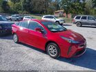 2021 Toyota Prius L Eco Red vin: JTDKAMFUXM3133862