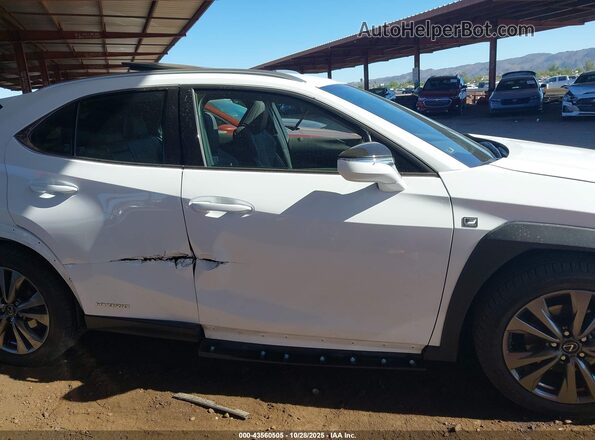 JTHU9JBH3K2003707 2019 LEXUS UX 250H White Вид задньої частини салону