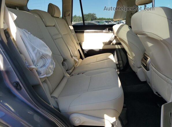 JTJAM7BX4P5377677 2023 LEXUS GX Gray Widok wnętrza z tyłu