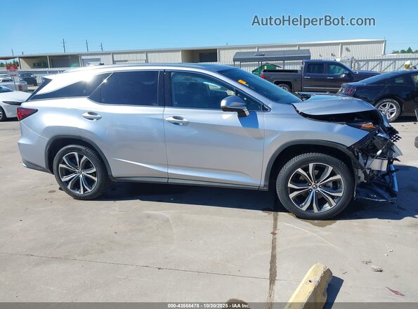 JTJHZKEAXN2024921 2022 LEXUS RX 350L Silver Вид задньої частини салону