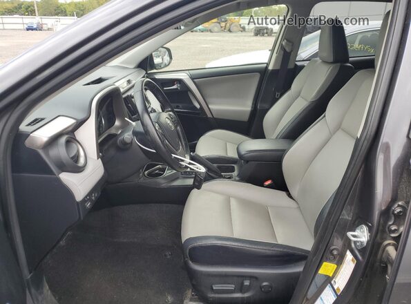 JTMDFREV5JJ193282 2018 TOYOTA LIMITED Gray Вид салону спереду