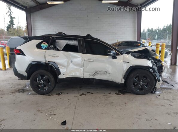 JTMEWRFV1LD550283 2020 TOYOTA RAV4 HYBRID White Vista interior trasera