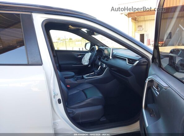 JTMEWRFV8KJ019310 2019 TOYOTA RAV4 HYBRID Белый Вид салона спереди