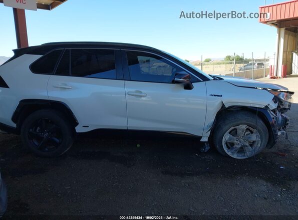 JTMEWRFV8KJ019310 2019 TOYOTA RAV4 HYBRID Белый Вид задней части салона