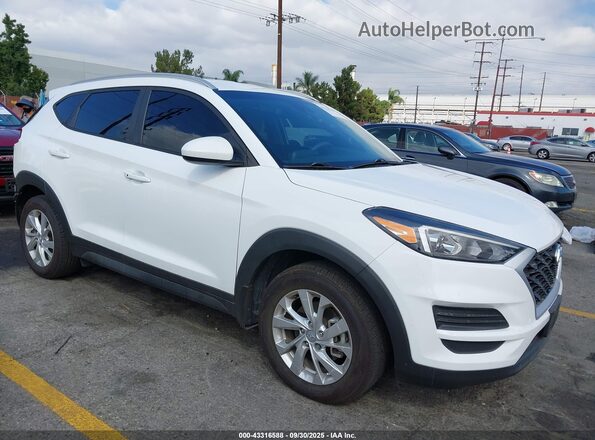KM8J33A45MU299641 2021 HYUNDAI TUCSON White Front right