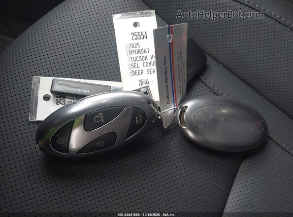 KM8JCDD11SU379376 2025 HYUNDAI TUCSON HYBRID Синий Вид панели приборов