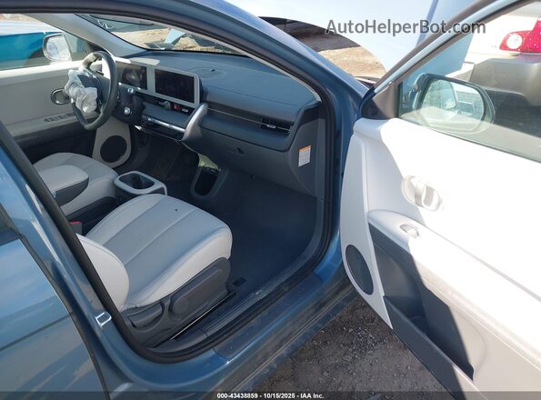 KM8KNDAF4PU203072 2023 HYUNDAI IONIQ 5 Blue Widok wnętrza z przodu