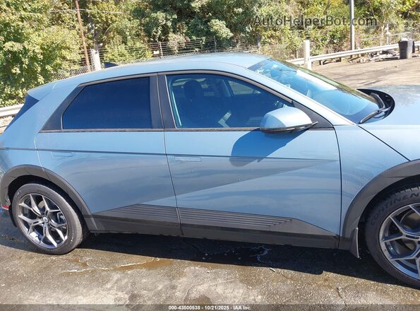 KM8KNDAF4PU204626 2023 HYUNDAI IONIQ 5 Light Blue Вид задней части салона