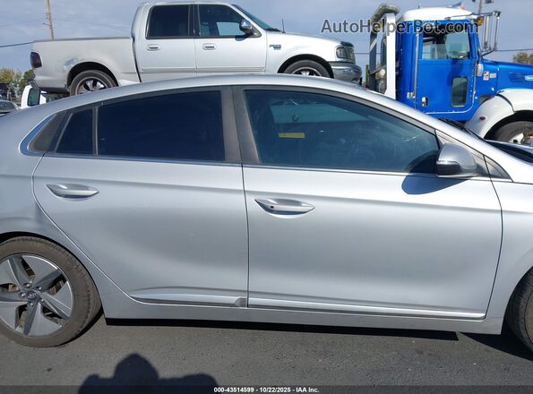 KMHC85LC8MU261296 2021 HYUNDAI IONIQ HYBRID Серебряный Вид задней части салона