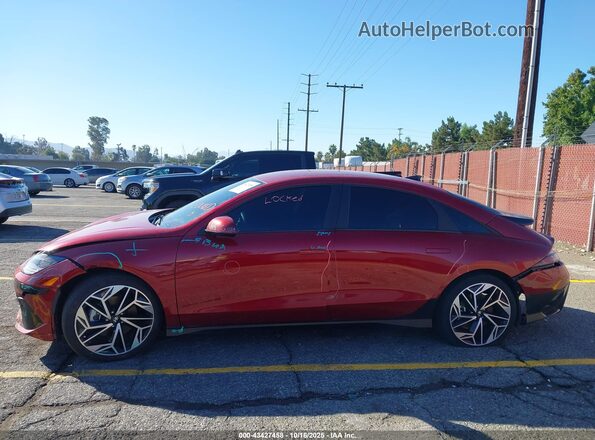 KMHM34AA5PA047323 2023 HYUNDAI IONIQ 6 Maroon Vista interior trasera