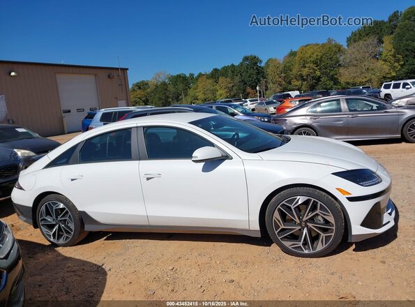 KMHM34AC8RA081406 2024 HYUNDAI IONIQ 6 White Vista interior trasera