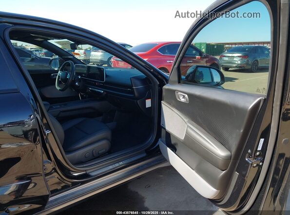 KMHM54AA1RA054122 2024 HYUNDAI IONIQ 6 Черный Вид салона спереди