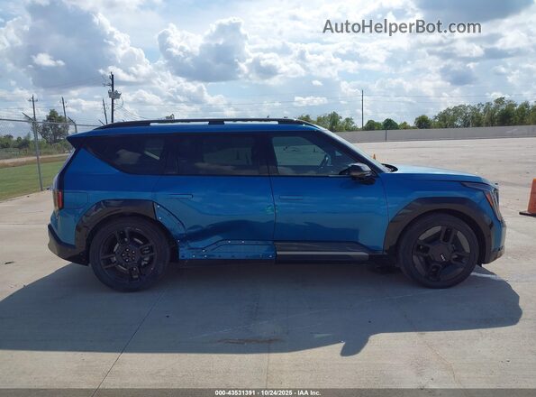 KNDAEFS58R6024767 2024 KIA EV9 Бирюзовый Вид задней части салона