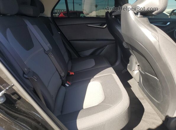 KNDCP3LE7S5264792 2025 KIA NIRO Black Vista interior trasera