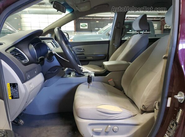 KNDMB5C10H6308503 2017 KIA SEDONA Бордовый Вид салона спереди