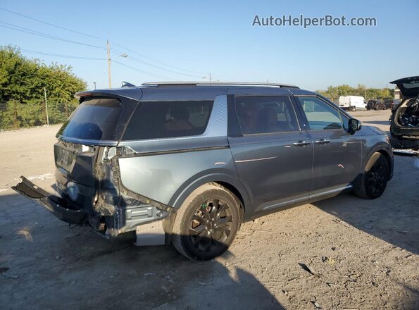 KNDNE5H37P6209097 2023 KIA CARNIVAL Синий Задняя правая четверть