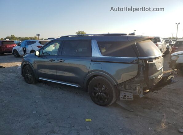 KNDNE5H37P6209097 2023 KIA CARNIVAL Синий Задняя левая четверть