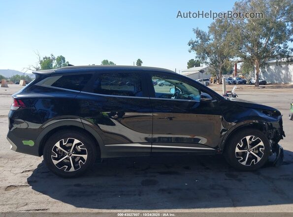 KNDPVCAG7P7014928 2023 KIA SPORTAGE HYBRID Black Widok wnętrza z tyłu