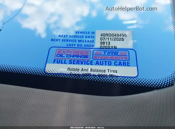 LRBFZME40RD049495 2024 BUICK ENVISION Red ხელსაწყოთა პანელის ხედი