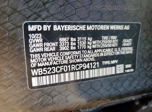 WB523CF01RCP94121 2024 BMW IX White Widok naklejki z numerem VIN
