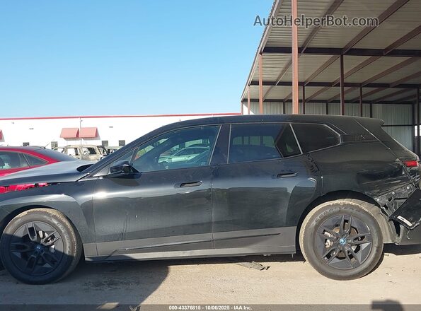 WB523CF04RCN47773 2024 BMW IX Черный Вид задней части салона