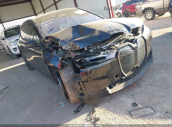 WB523CF04RCN47773 2024 BMW IX Черный Передняя правая четверть