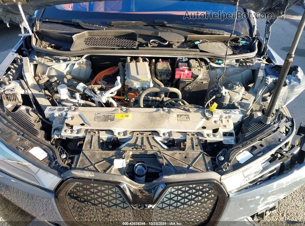 WB523CF06SCT60704 2025 BMW IX Gray Vista trasera