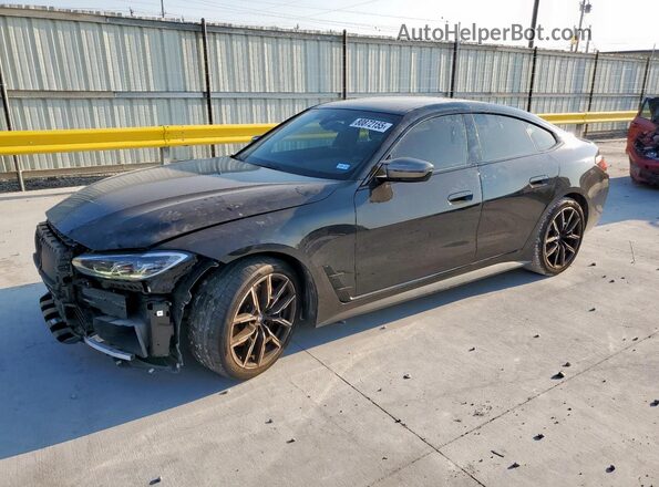 WBA13AW00NFM45784 2022 BMW M4 Black Vista tres cuartos delantera izquierda
